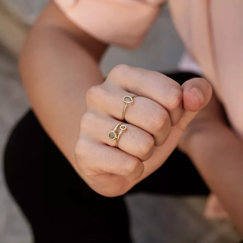 Anillo Oro 18 Quilates Gemini Topacio y Peridoto