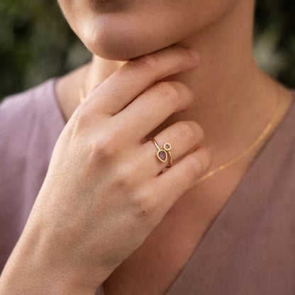 Anillo Oro 18 Quilates Binae Amatista y Topacio